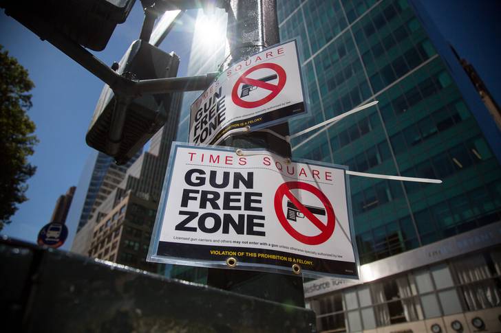 A sign in Times Square  notes that the area has been newly designated a "Gun Free Zone."